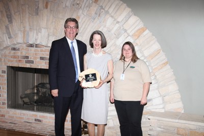 Jane Morse receives the Volunteer of the Year Award at the 2014 Arbor Day Ceremony.